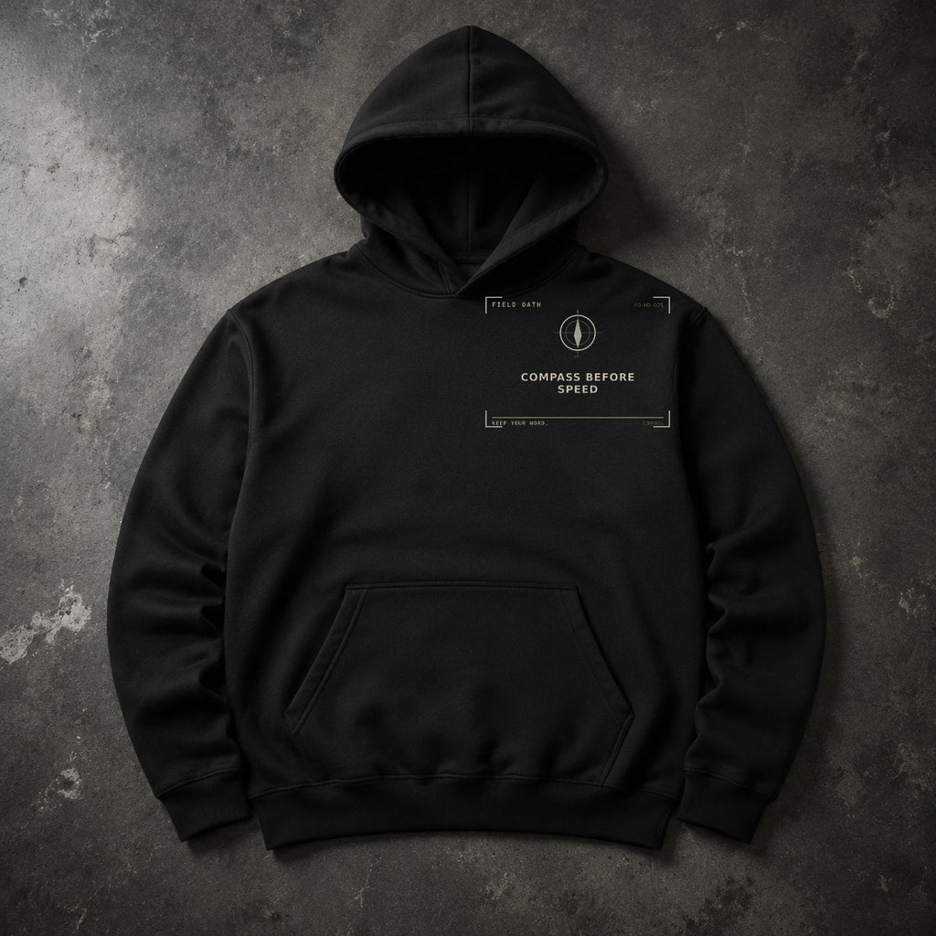 FIELD OATH Compass Before Speed Hoodie black hoodie front artwork on dark concrete
