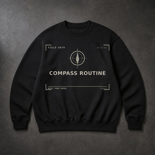 FIELD OATH Compass Routine Crewneck black crewneck front artwork on dark concrete