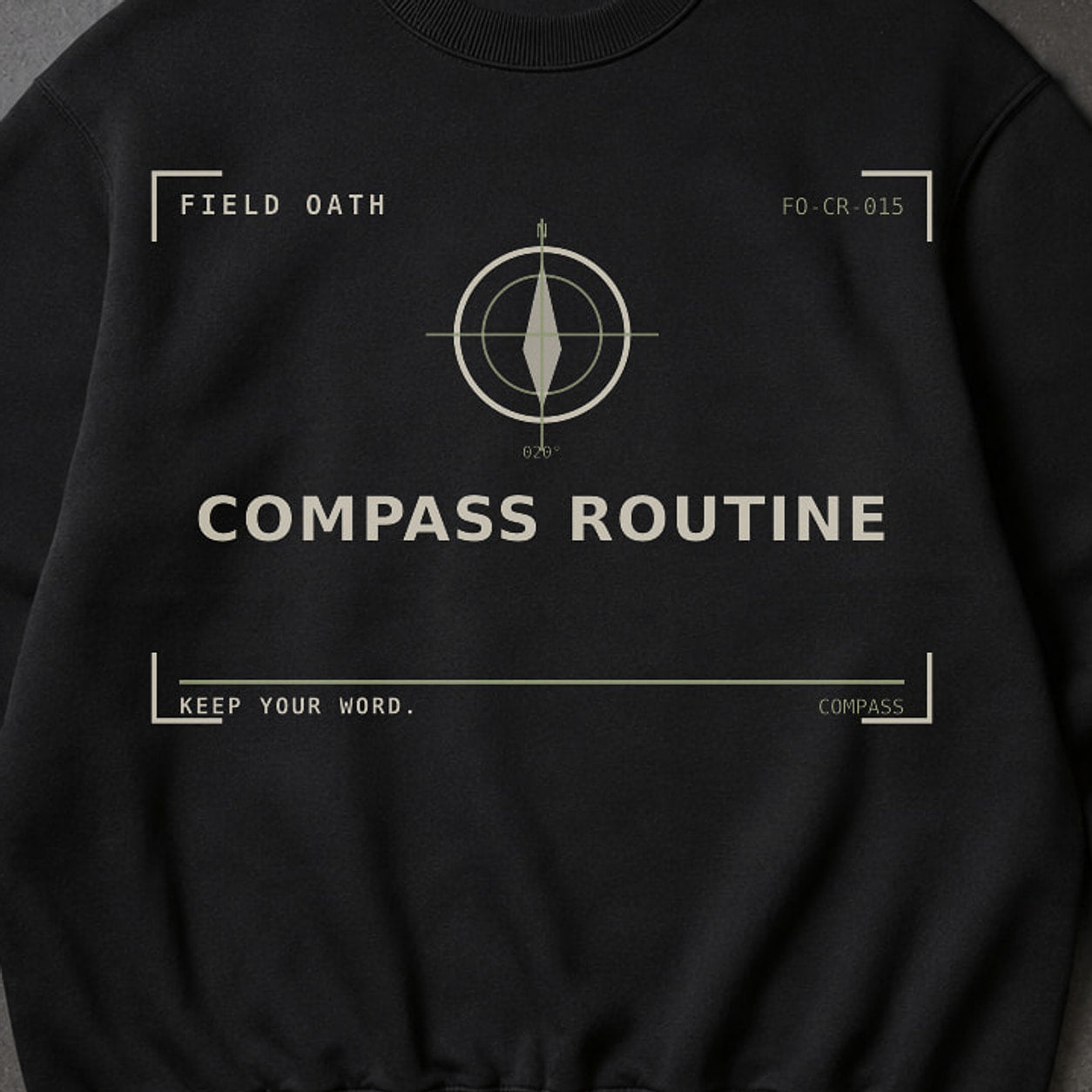 FIELD OATH Compass Routine Crewneck close-up of original tactical artwork and fabric texture