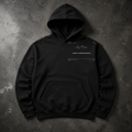 FIELD OATH Core Coordinates Hoodie black hoodie front artwork on dark concrete
