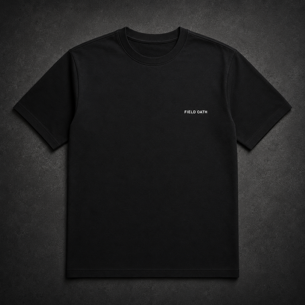 FIELD OATH Crest Line T-Shirt front view in black with small FIELD OATH chest identifier