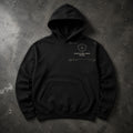 FIELD OATH Discipline Over Mood Hoodie black hoodie front artwork on dark concrete
