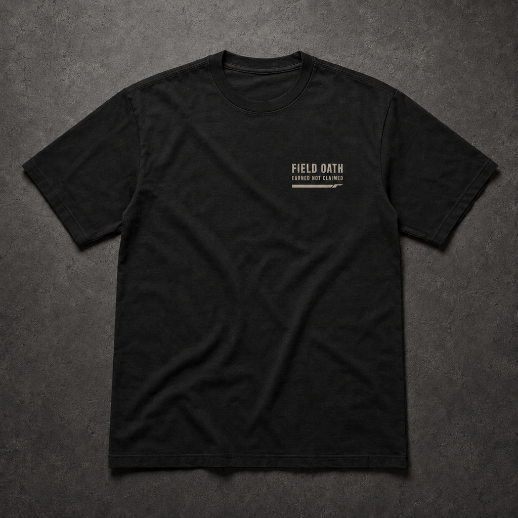 FIELD OATH Earned Not Claimed T-Shirt black front with small chest identifier