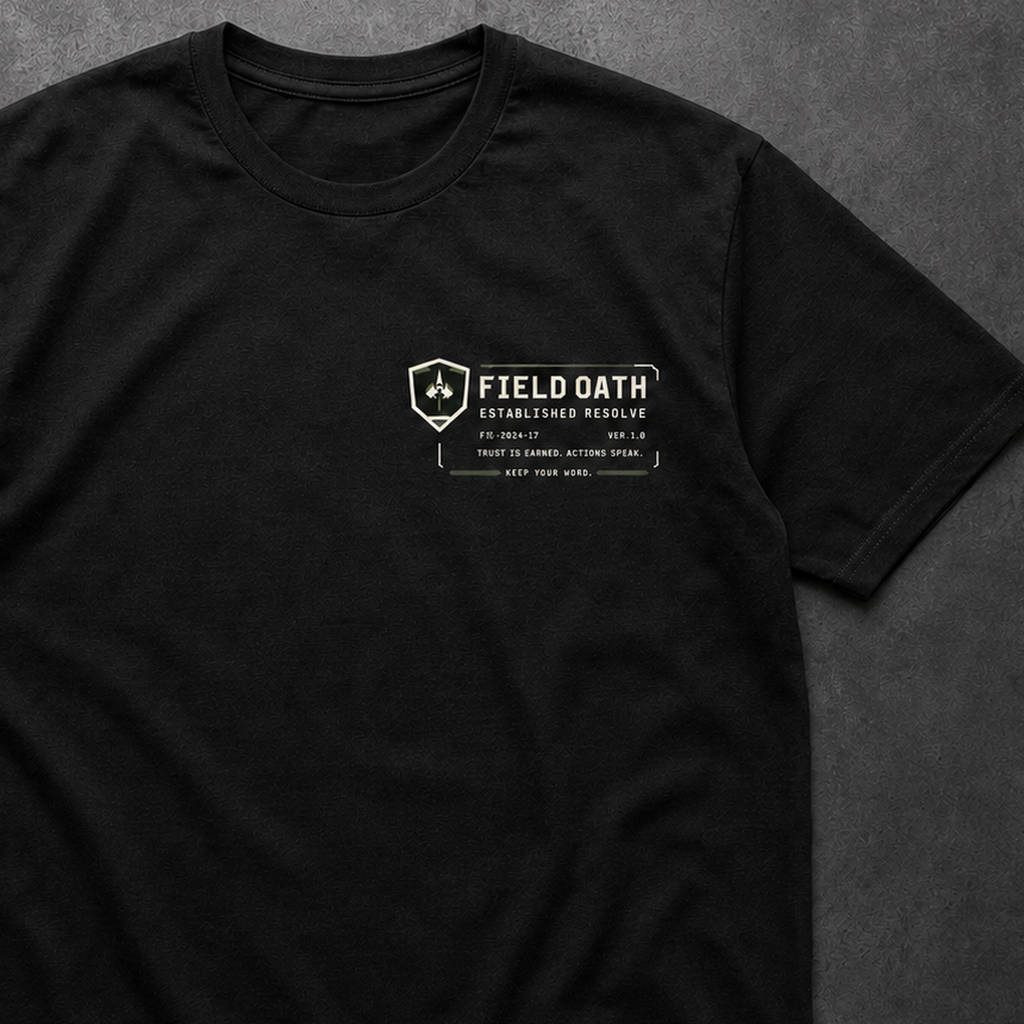 Close-up of FIELD OATH Established Resolve T-Shirt left-chest identifier and technical print