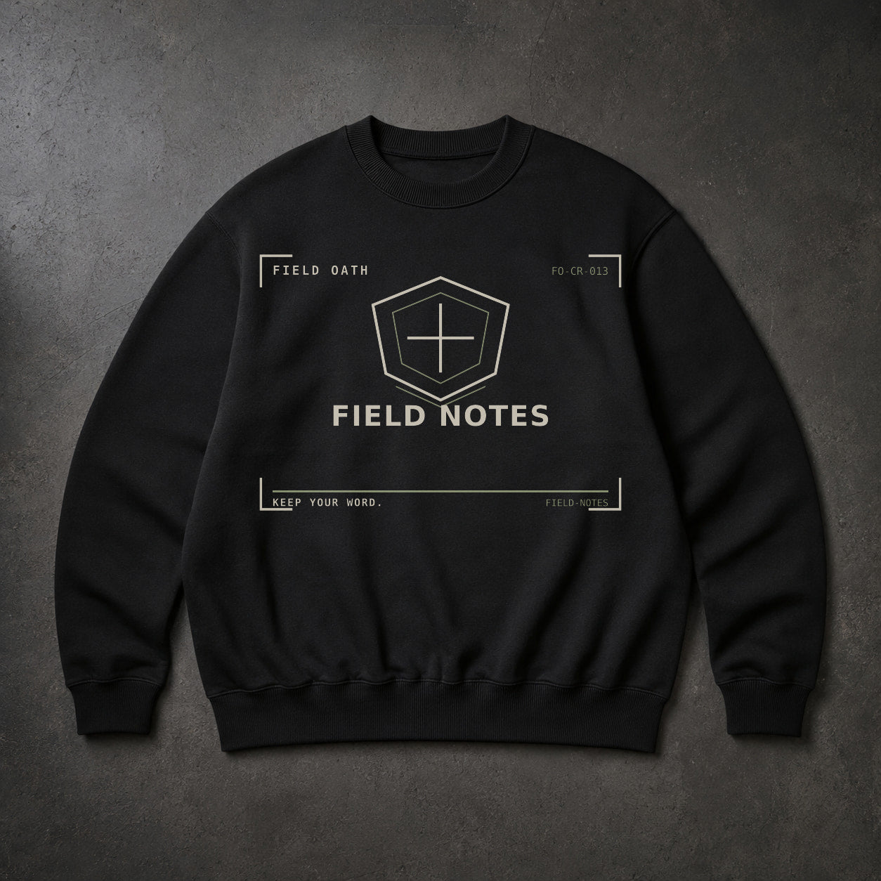 FIELD OATH Field Notes Crewneck black crewneck front artwork on dark concrete