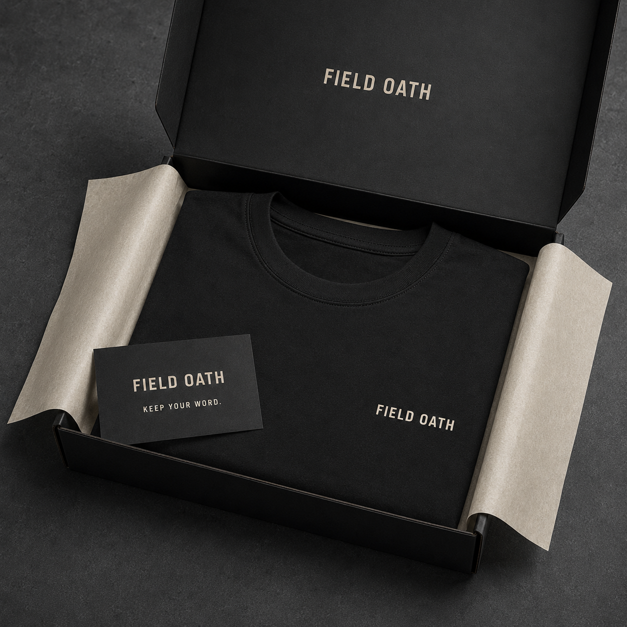 Black FIELD OATH Field Standard T-Shirt folded inside FIELD OATH tactical packaging