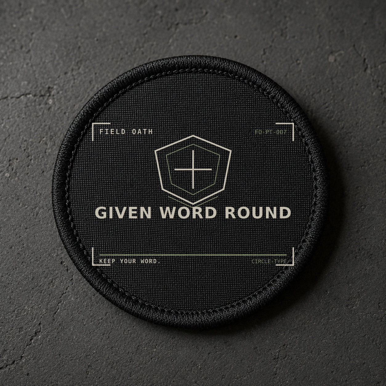 FIELD OATH Given Word Round Patch round black embroidered patch with original FIELD OATH artwork