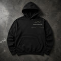 FIELD OATH Ground Conditions Hoodie black hoodie front artwork on dark concrete