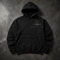 FIELD OATH Keep Your Word Heavy Hoodie black hoodie front artwork on dark concrete