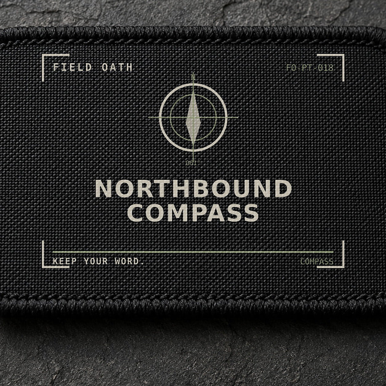 FIELD OATH Northbound Compass Patch close-up showing woven face, stitched border and embroidery detail
