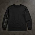 FIELD OATH Northern Route Long Sleeve black long sleeve sleeve artwork on dark concrete