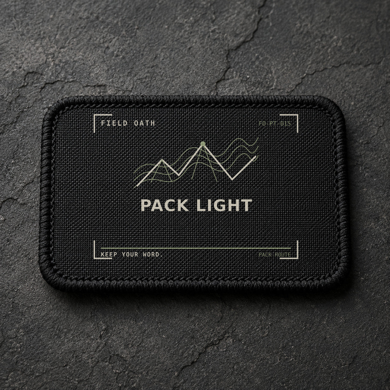 FIELD OATH Pack Light Patch rectangular black embroidered patch with original FIELD OATH artwork