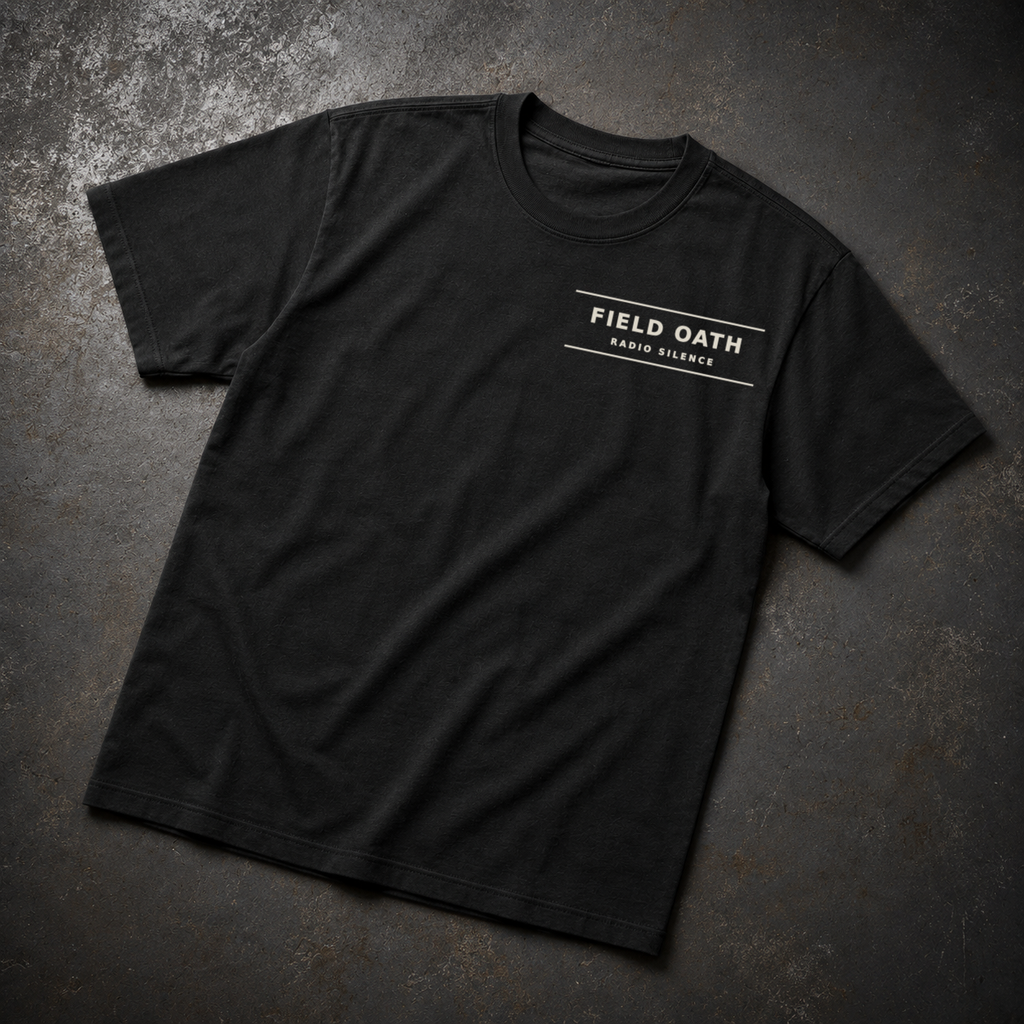 Black FIELD OATH Radio Silence T-Shirt front flat lay with compact chest identifier