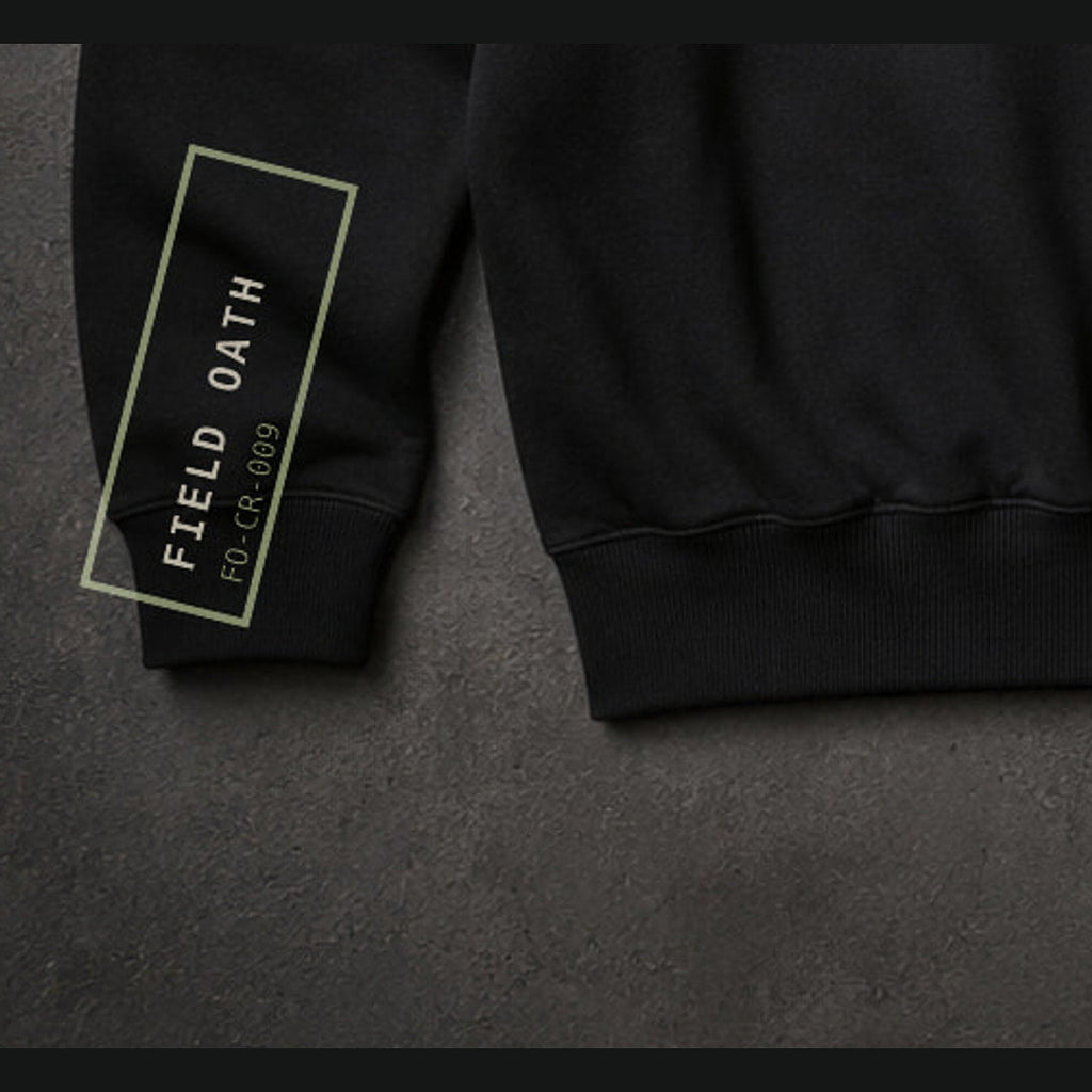 FIELD OATH Relentless Work Crewneck close-up of original tactical artwork and fabric texture