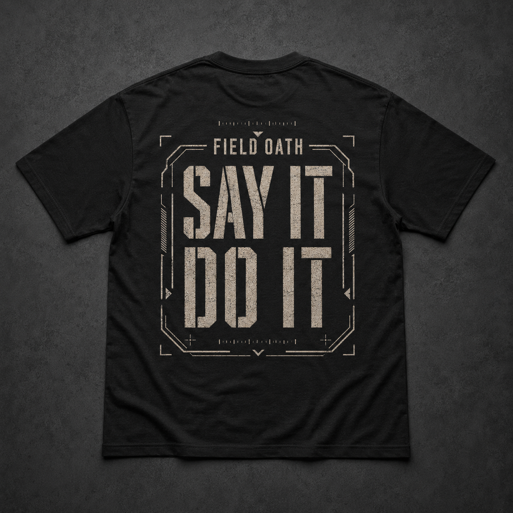 Black FIELD OATH Say It Do It T-Shirt back flat lay with distressed tactical command graphic