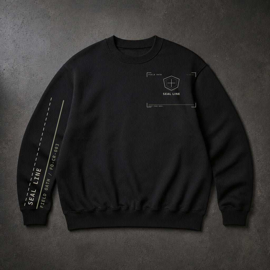 FIELD OATH Seal Line Crewneck black crewneck front artwork on dark concrete