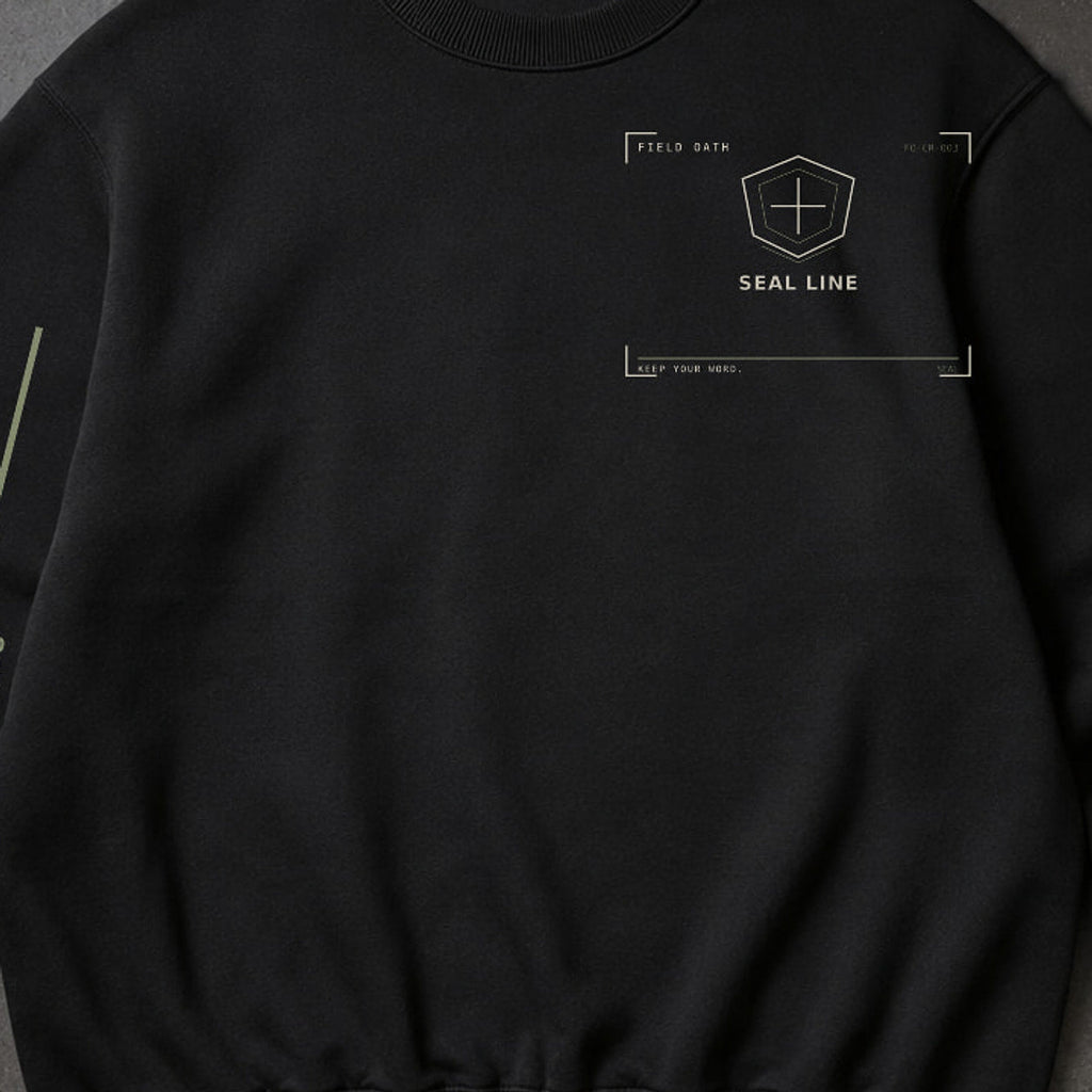 FIELD OATH Seal Line Crewneck close-up of original tactical artwork and fabric texture
