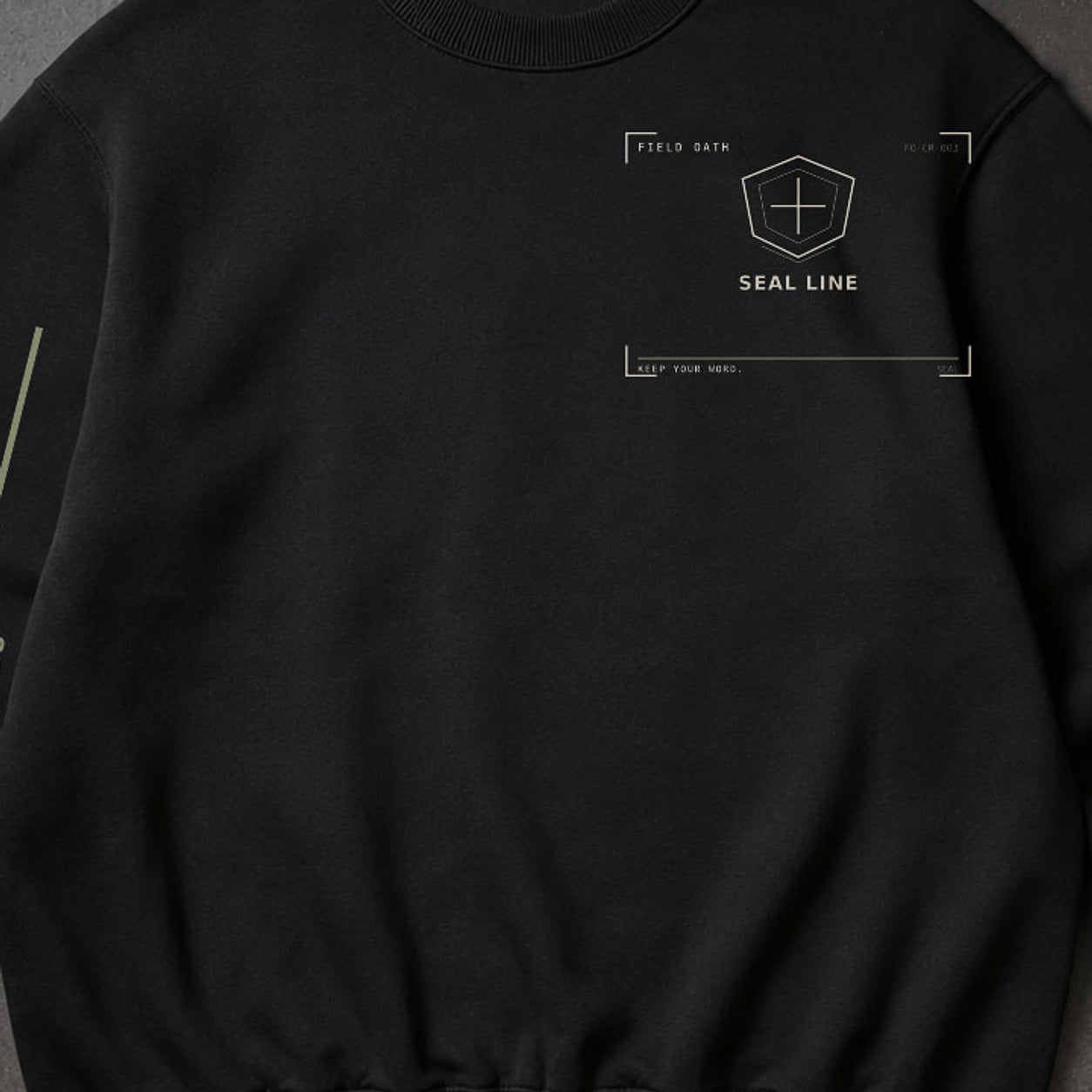 FIELD OATH Seal Line Crewneck close-up of original tactical artwork and fabric texture