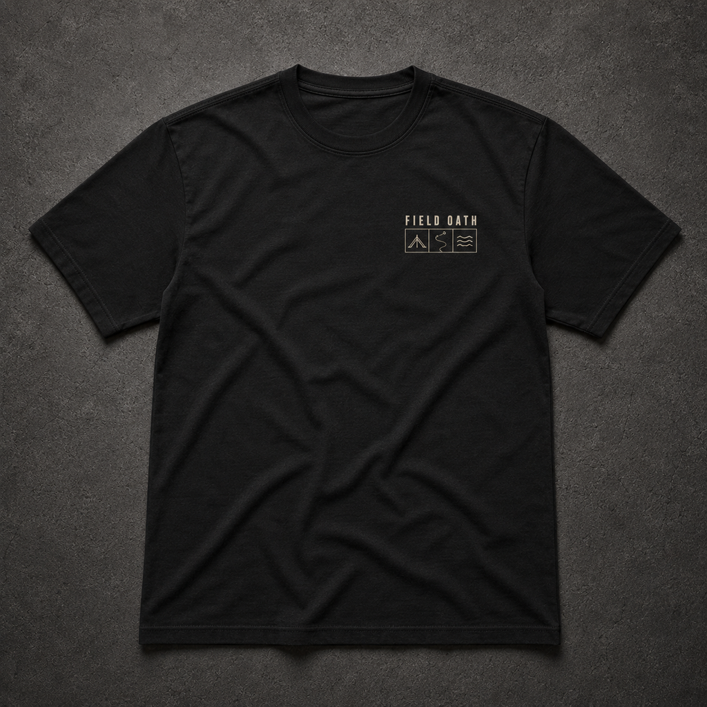 Black FIELD OATH Shelter Route Water T-Shirt front flat lay with modular field-grid chest identifier
