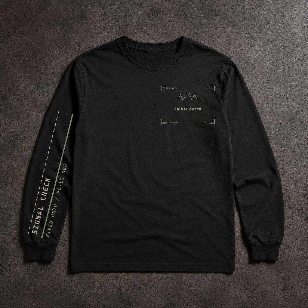 FIELD OATH Signal Check Long Sleeve black long sleeve front artwork on dark concrete
