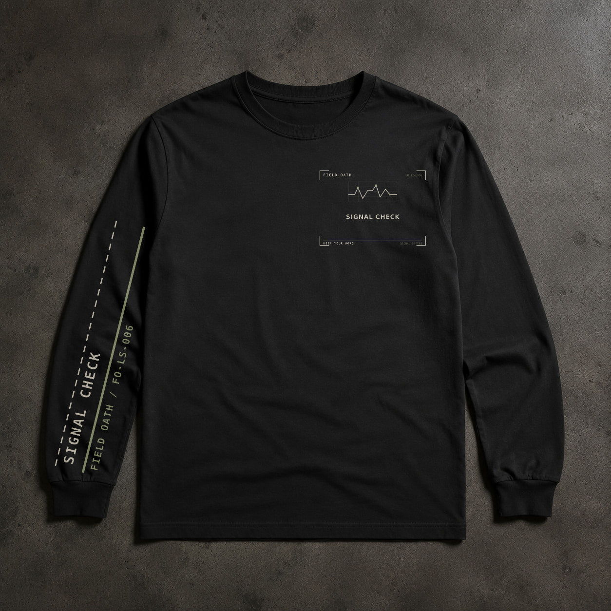 FIELD OATH Signal Check Long Sleeve black long sleeve front artwork on dark concrete
