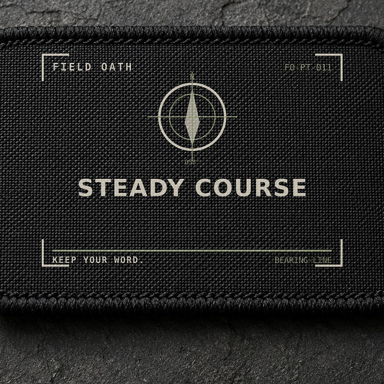 FIELD OATH Steady Course Patch close-up showing woven face, stitched border and embroidery detail