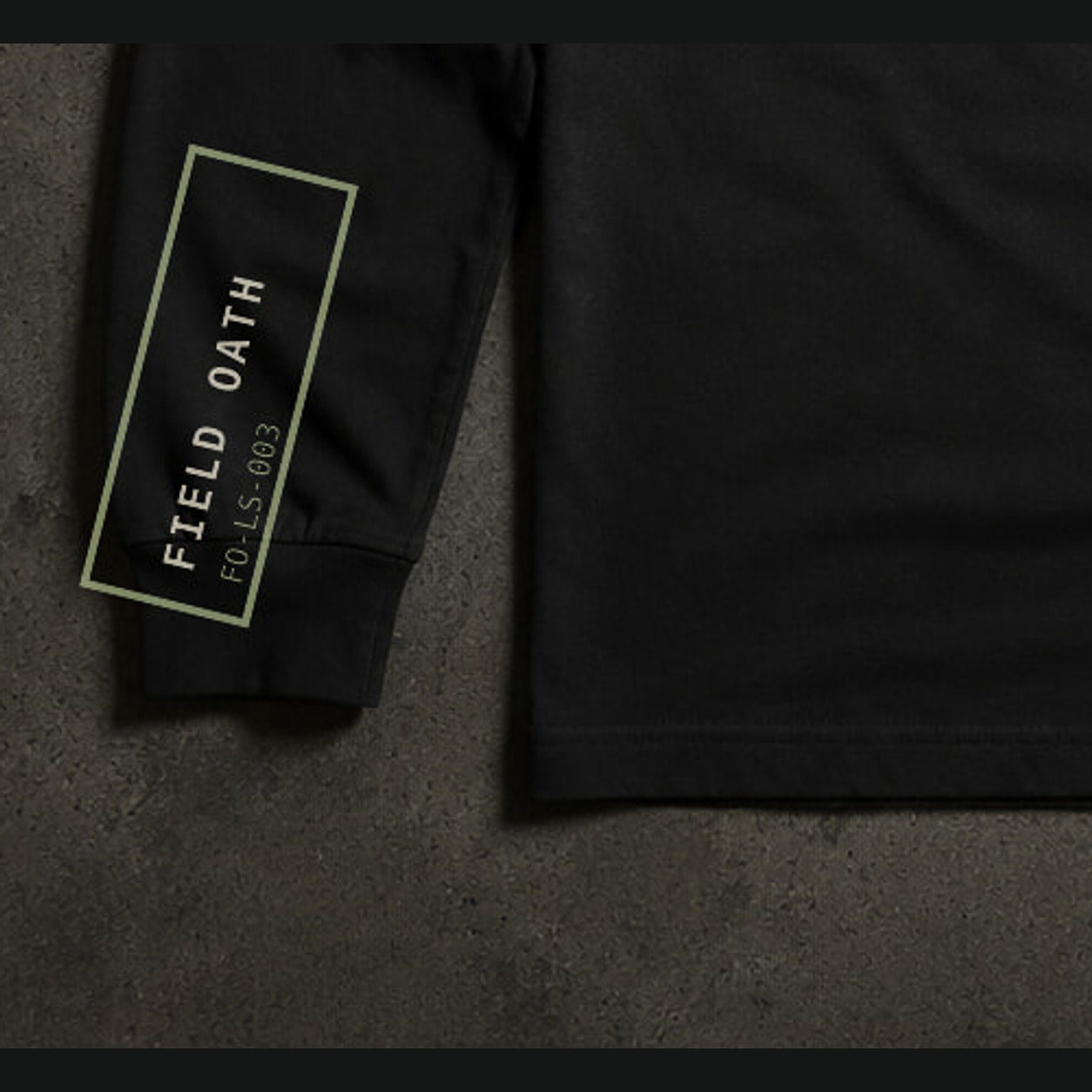 FIELD OATH Under Load Cuff Long Sleeve close-up of original tactical artwork and fabric texture