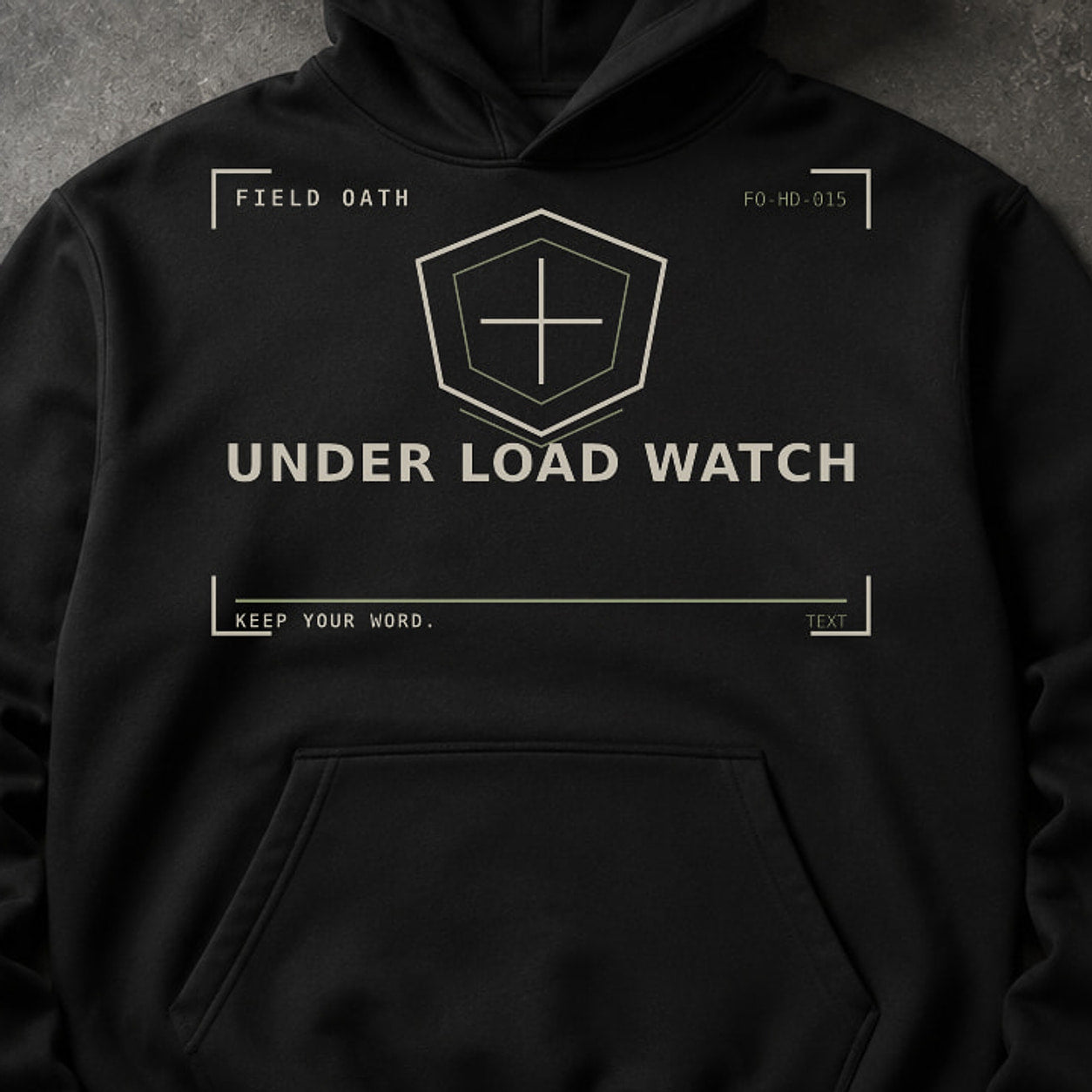 FIELD OATH Under Load Watch Hoodie close-up of original tactical artwork and fabric texture