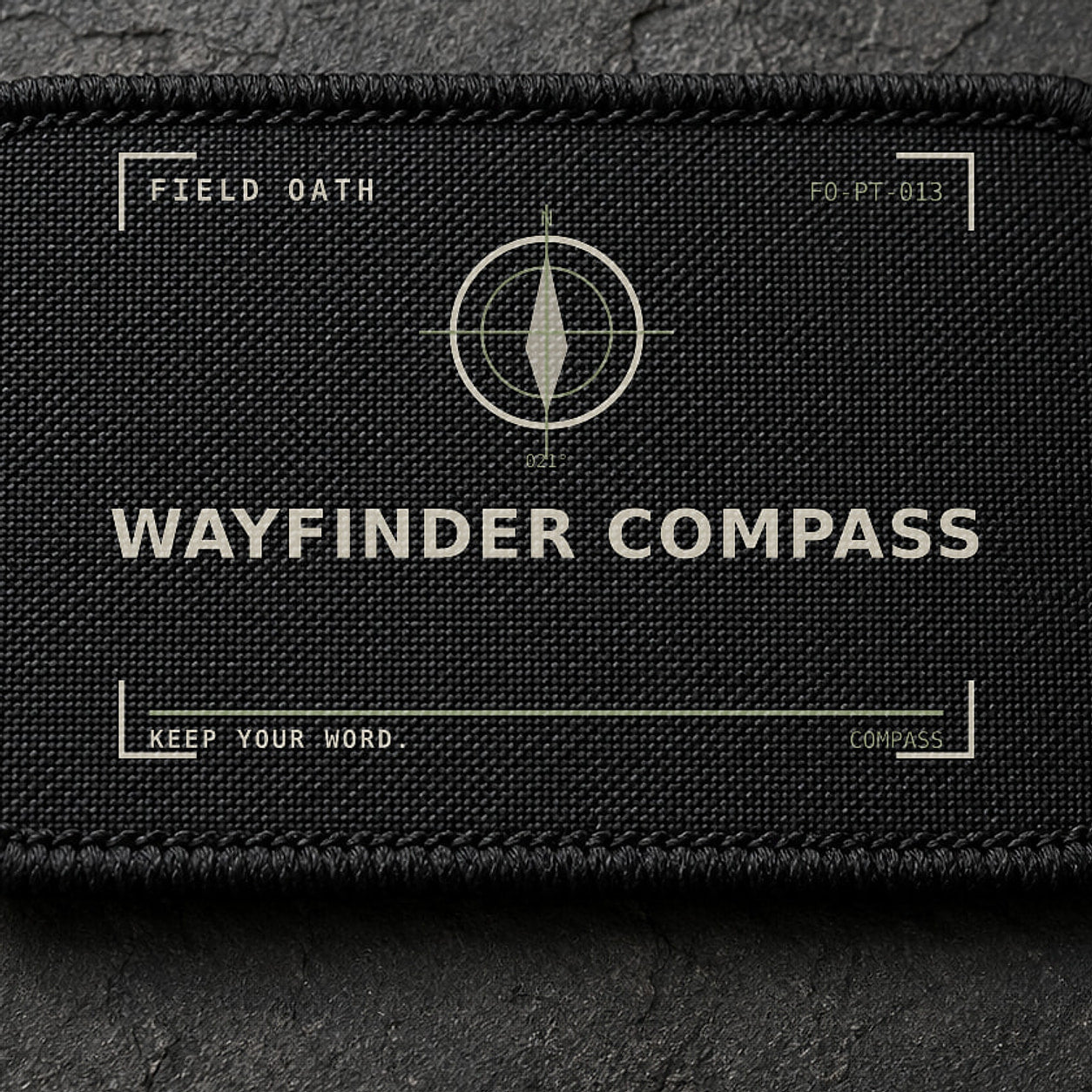FIELD OATH Wayfinder Compass Patch close-up showing woven face, stitched border and embroidery detail