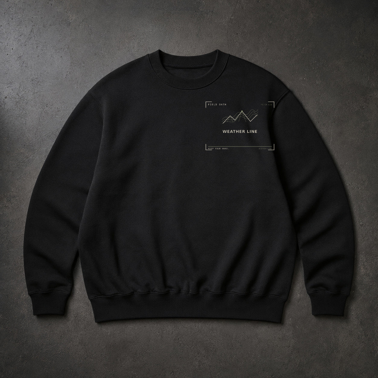 FIELD OATH Weather Line Crewneck black crewneck front artwork on dark concrete