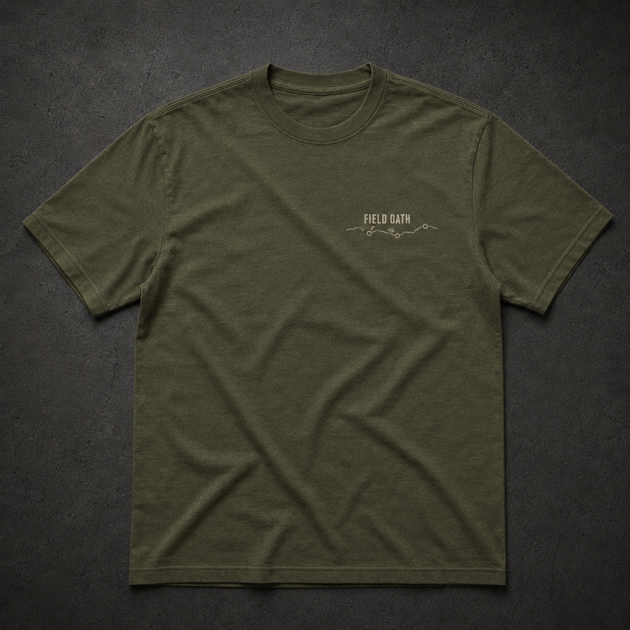 Field olive FIELD OATH Cold Coast T-Shirt front flat lay with coastline chest identifier